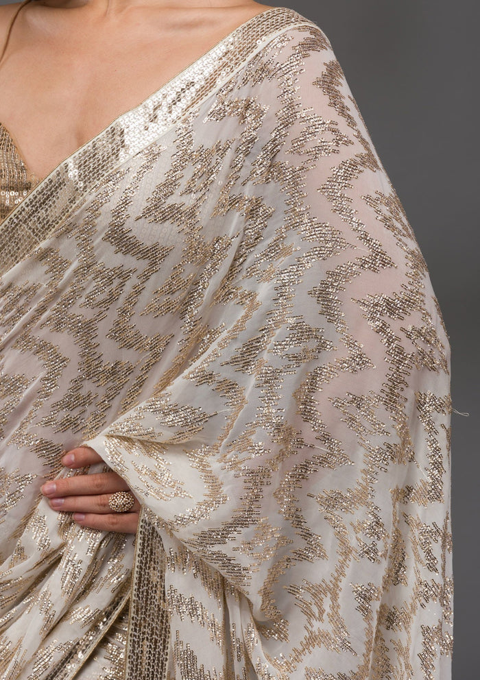 Fashion Cave Off White Sequins Georgette Saree