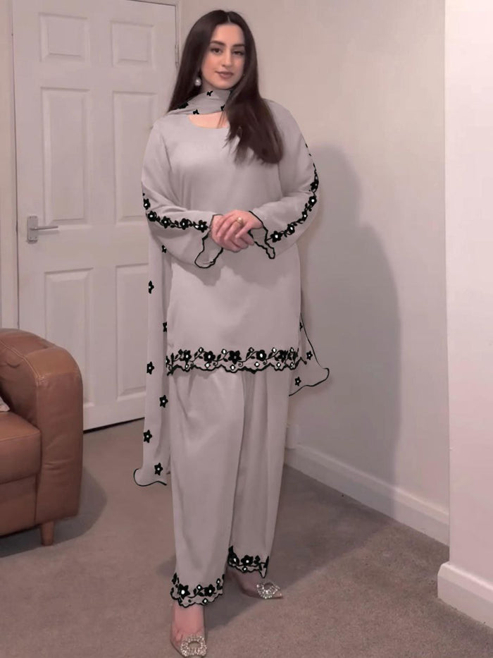 FASHION CAVE Elegant cream georgette set with embroidered mirror work top, palazzo pants, and matching dupatta for a graceful look.